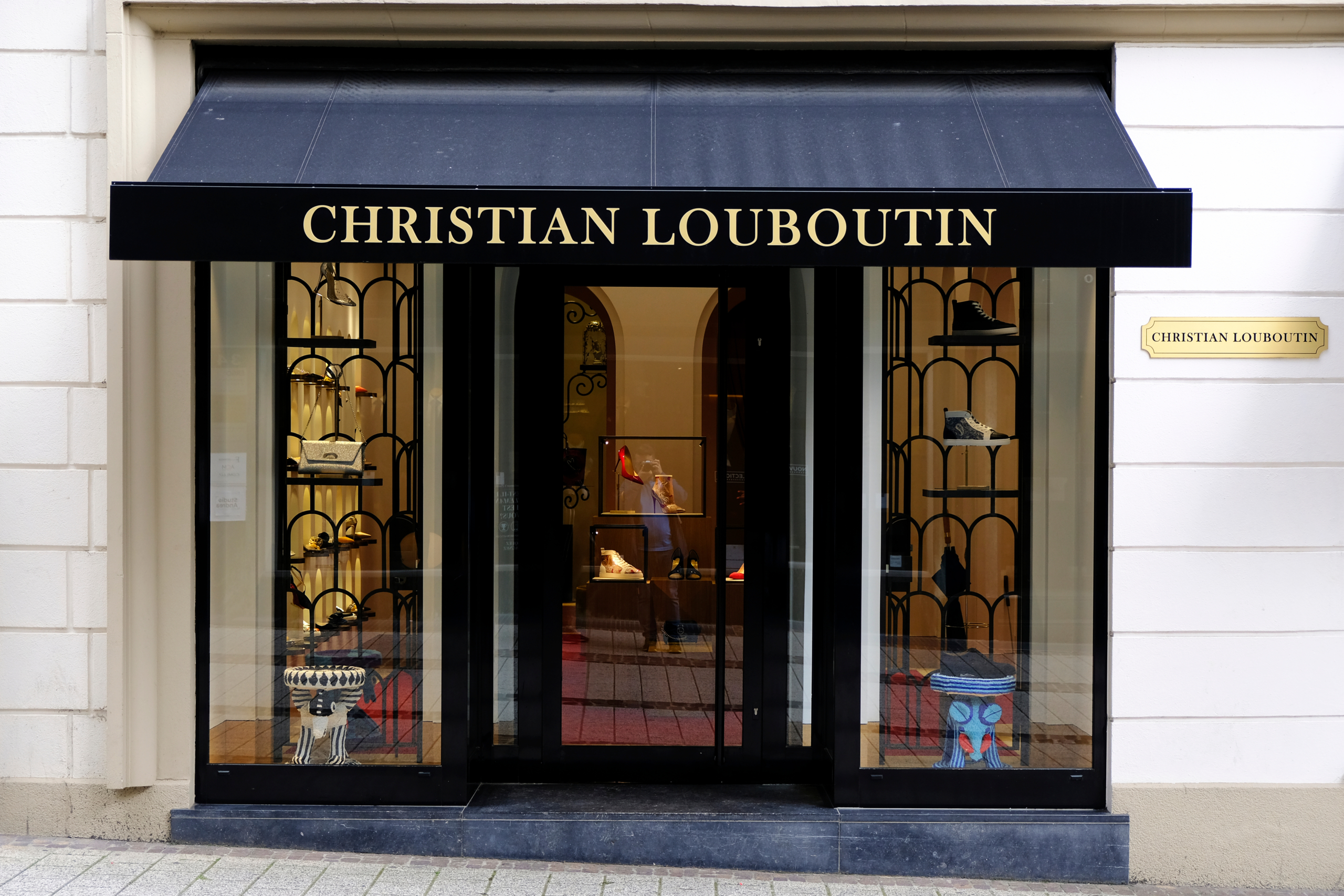 Christian Louboutin  — słynna czerwona podeszwa