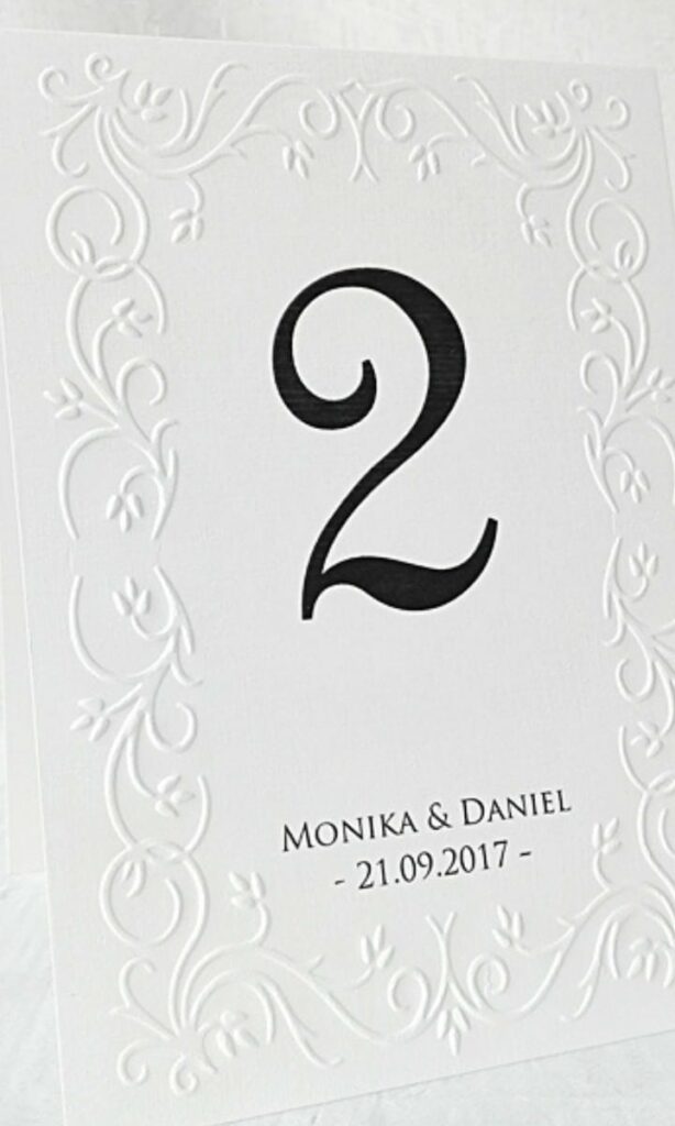 oryginalne numerki na stoły weselne
